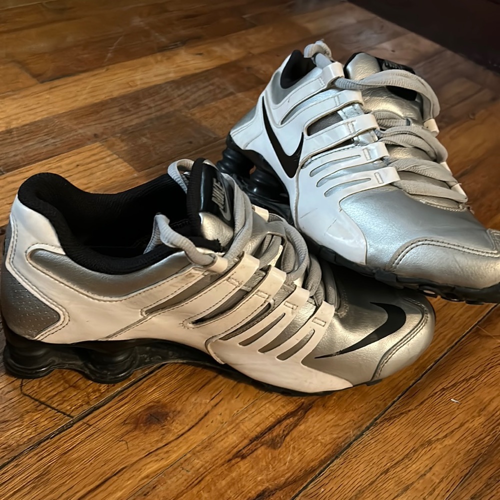 Worn women’s Nike Shocks.